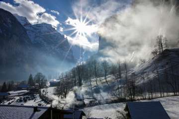 The village of Lauterbrunnen in the winter fog.