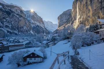The village of Lauterbrunnen with fresh snow and morning sun